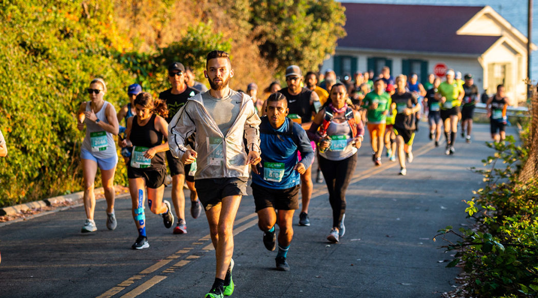 Runners run down one of San Francisco's famous hills