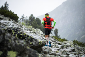A trail runner carries his nutrition in a running pack