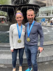 Hilary Baude & Matt Cavanaugh at the Flying Pig Marathon in Cincinnati, one of their 1K12M marathons