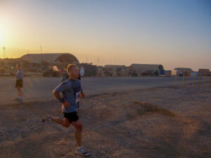 Matt Cavanaugh runs a 10K at a base in Iraq, early 2006.