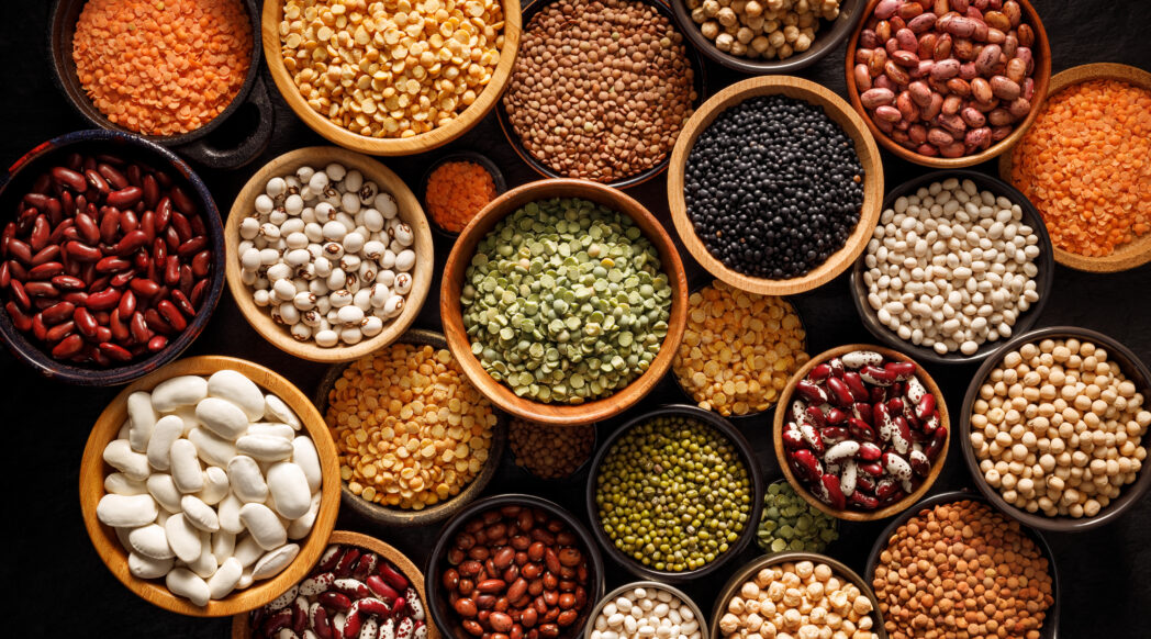 Lentils and legumes in woodes bowls