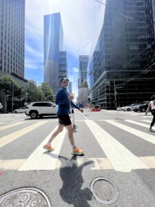 Lucie Nestrasilova walking across a street in San Francisco