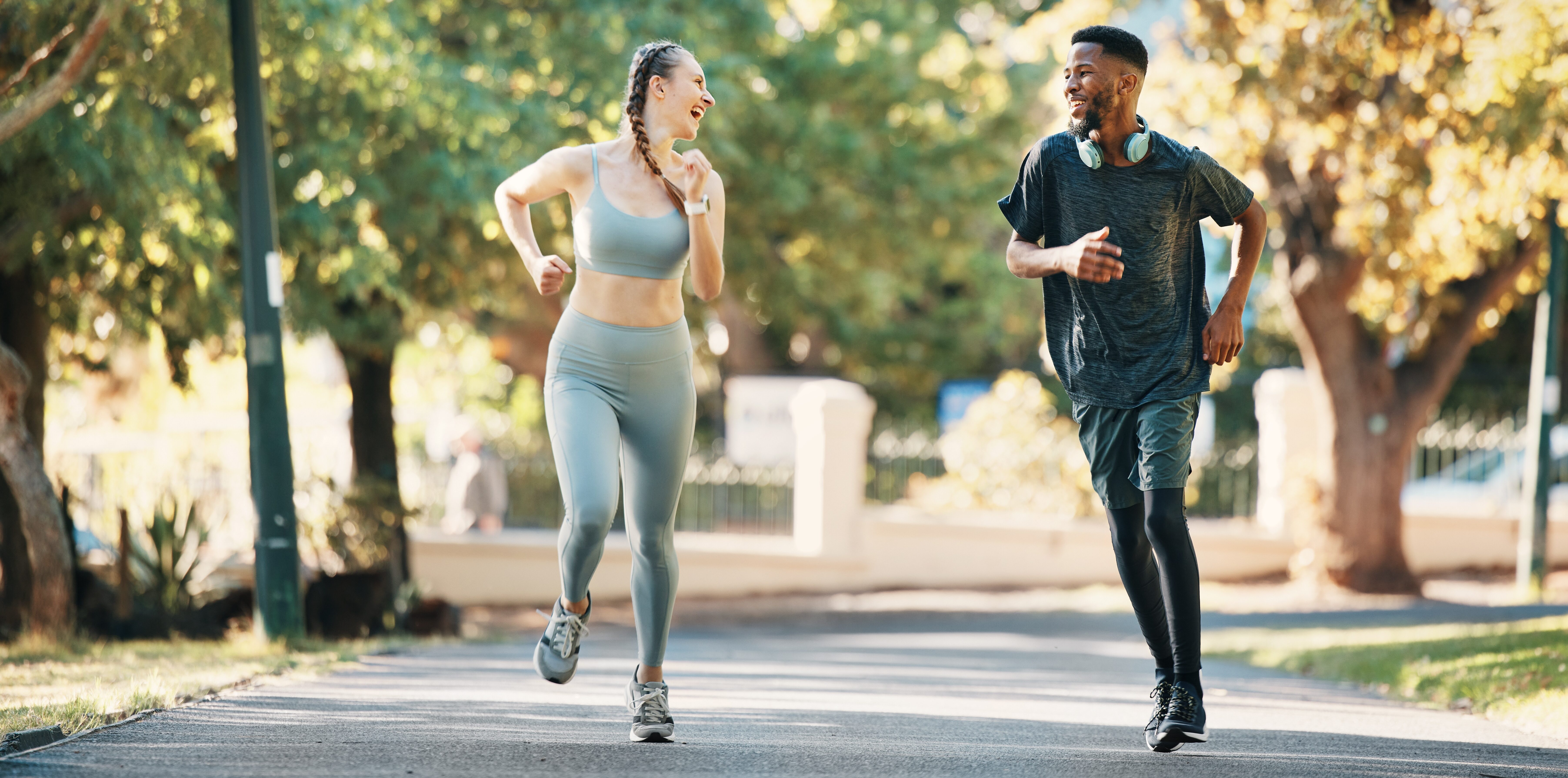 A diverse couple on their short run.