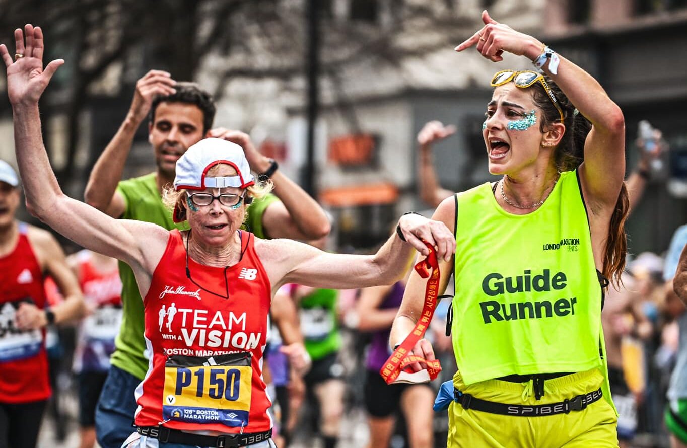 Alexi Pappas guides Lisa Thompson at the 2024 Boston Marathon. Photo Credit: the Boston Marathon