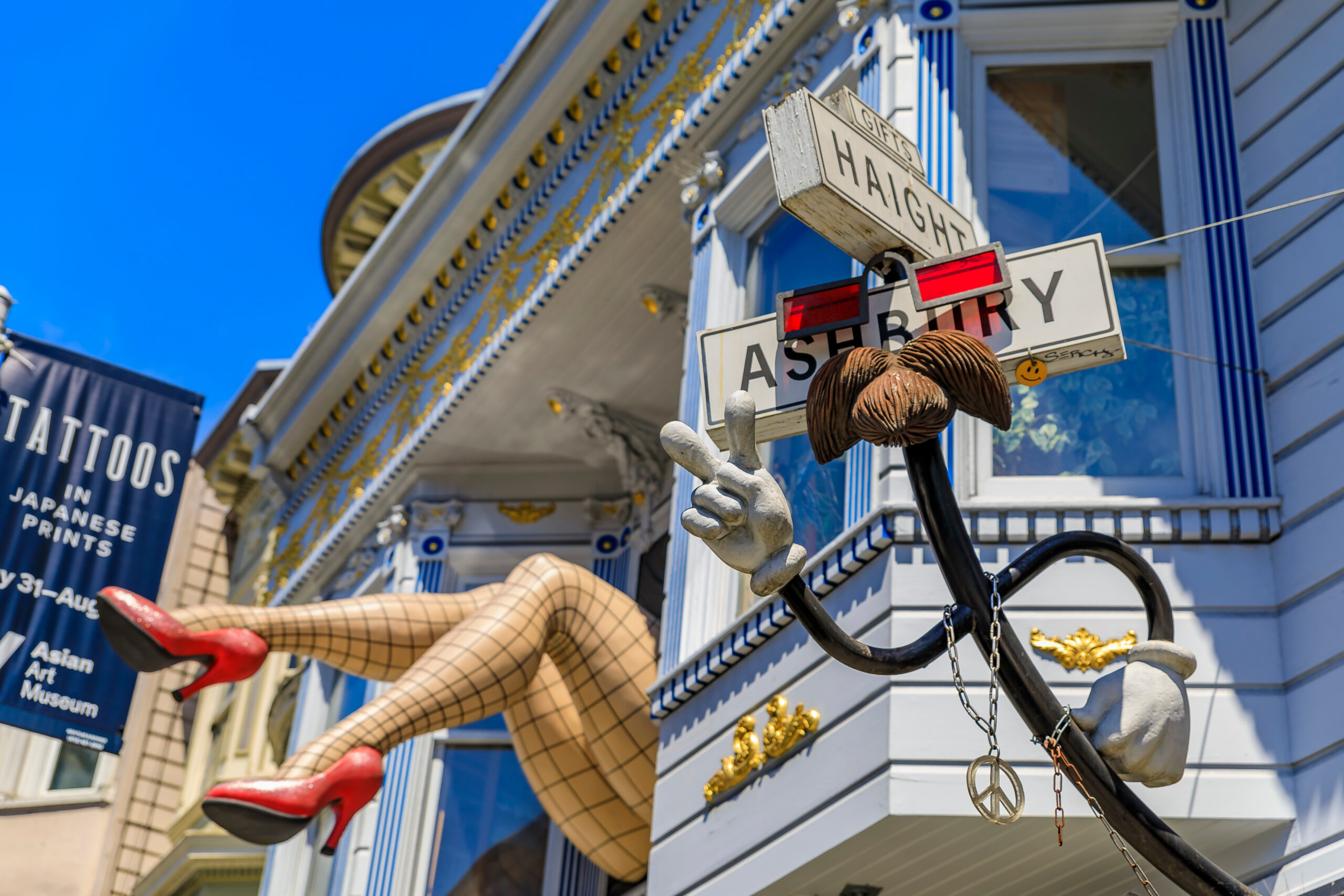 Haight Street view of the stockinged legs hanging out of the window. Haight Street comes after the famous Alvord Lake Bridge during the SF Marathon.