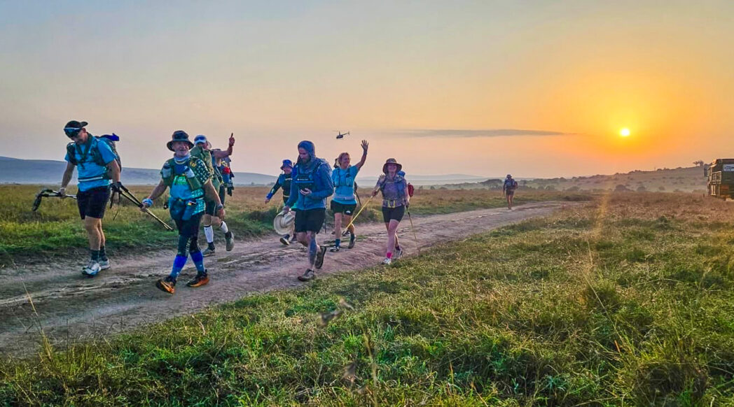 A group of runners at the For Rangers Ultra set out on their longest day as the sun rises behind them. Several runners set this goal despite their chronic illness.