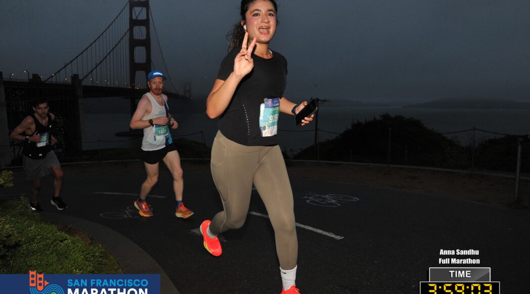 Anna Sandhu runs in the early-morning dark at the San Francisco Marathon