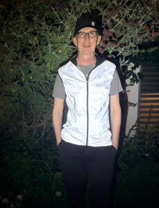 Scott Benbow wearing his highly reflective running vest which improves visibility during his nighttime runs