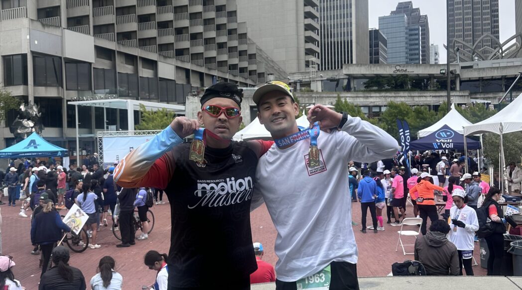 P-Lo with a medal after the San Francisco Marathon