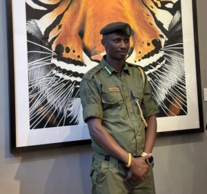 Lewa Head of Antipoaching Edward Ndiritu talks about charity and conservation at a "Fireside Chat" event organized by Save the Rhino