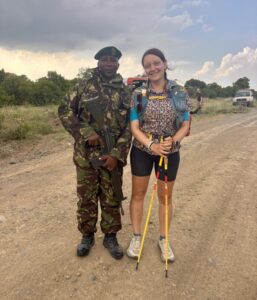The author and John Mamba, one of the rangers supported by For Rangers charity, pose for a photo 10km from the finish of the 230 km For Rangers Ultra