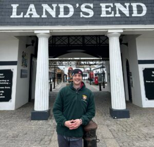 Dr Thomas Lambert poses in front of Land's End