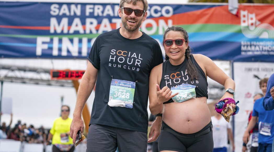 A couple has just finished the san francisco marathon, ready for their recovery